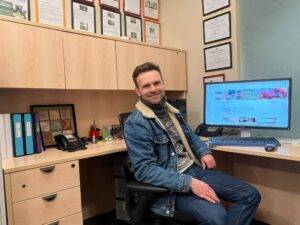 Vadim Garbuzov is sitting in the office